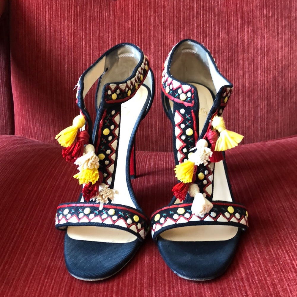Christian Louboutin pumps with tassels